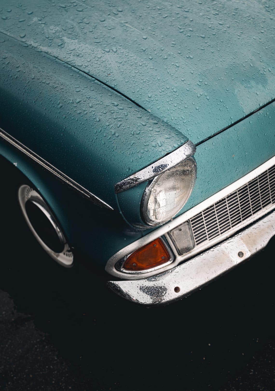 Frontal view of a Ford Anglia during a rainy day